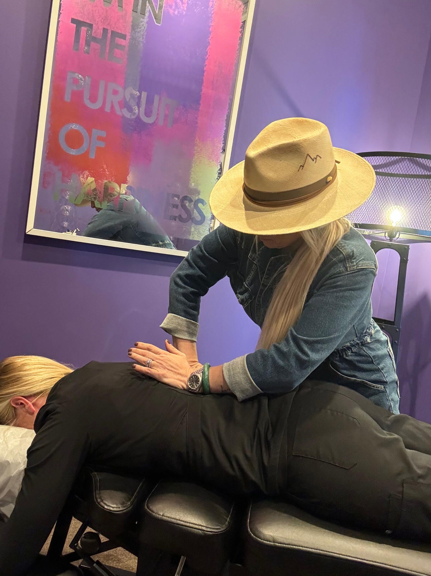 An adjustment in the purple treatment room