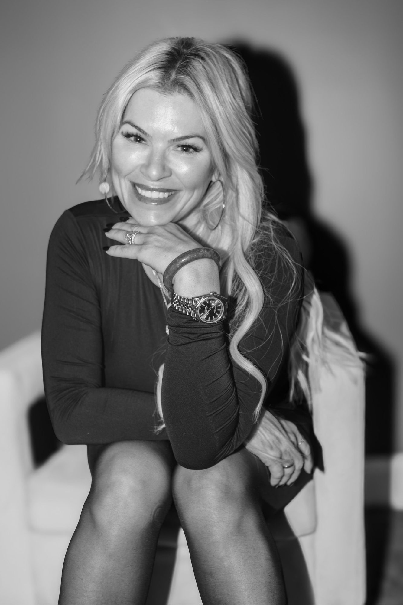 A black and white portrait of Dr. Christine